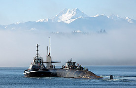 Submarine against a mountain backdrop
