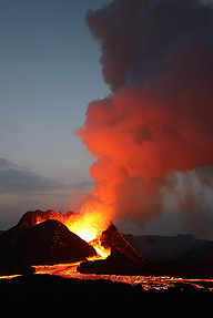 Image shows a volcano erupting